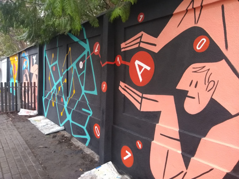 artystyczny mural na murze dla Biblioteki multimedialnej w Warszawie